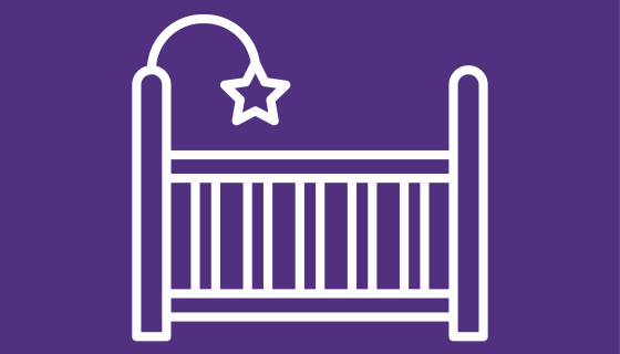 An image showing an icon graphic of a baby cot.