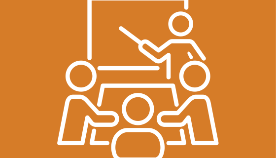 An image showing an icon graphic of people sitting around a table learning