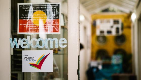 Entrance to an early childhood service showing its quality rating on the door